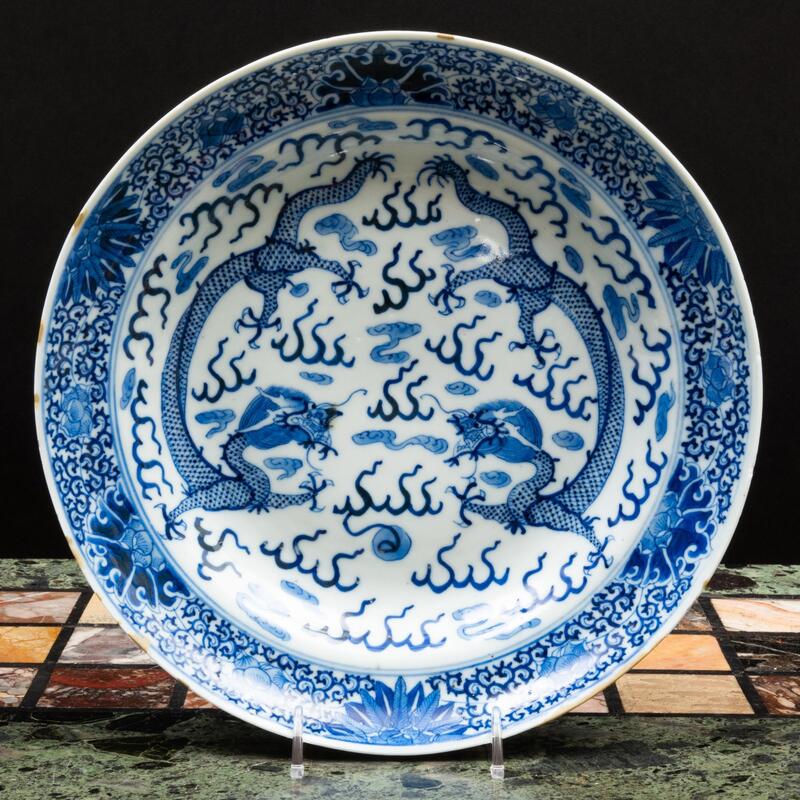 Appraisal: Chinese Blue and White Porcelain Dish with Dragons Chasing Flaming