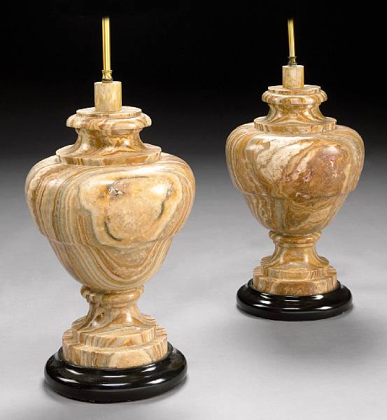 Appraisal: A pair of Neoclassical style veined marble table lamps fourth