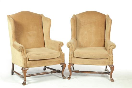 Appraisal: PAIR OF QUEEN ANNE-STYLE WING BACK ARMCHAIRS American th century