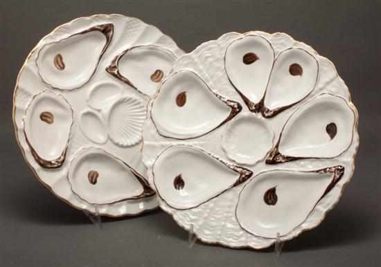 Appraisal: Two French painted porcelain oyster plates late th century in