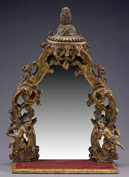 Appraisal: An Italian Rococo giltwood table mirror second quarter th century