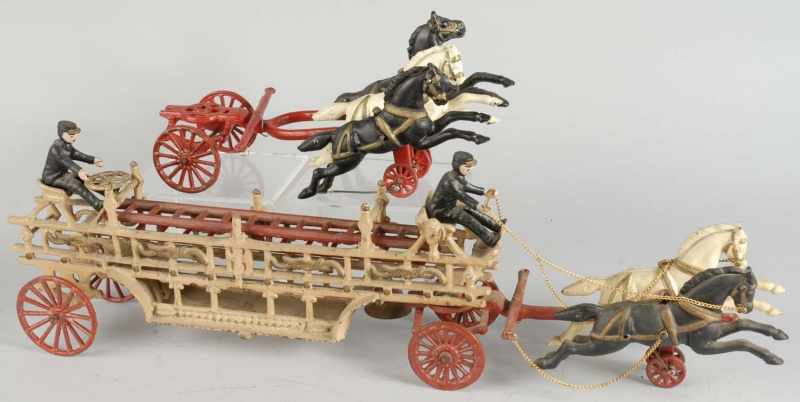 Appraisal: Cast Iron Horse-Drawn Fire Ladder Truck Toy Description Contemporary Includes