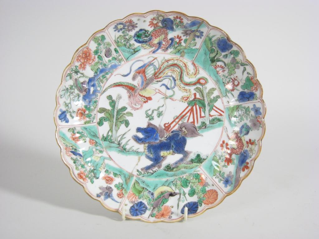 Appraisal: An th Century Chinese polychrome Plate painted kylin birds and