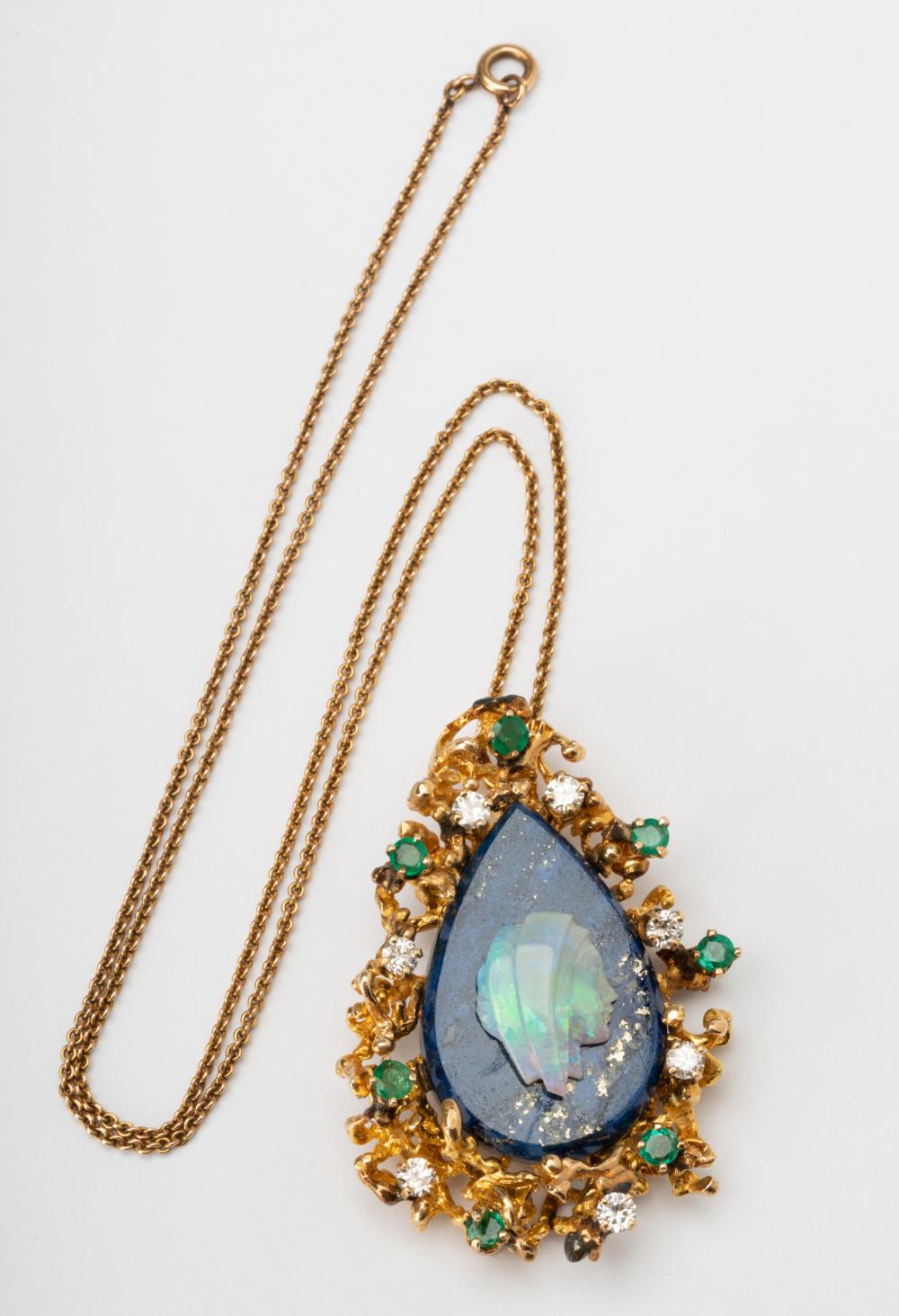 Appraisal: KARAT YELLOW GOLD MULTI-GEM PENDANT NECKLACECentering one pear-shape tablet-cut lapis