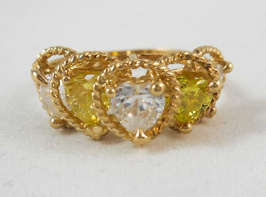 Appraisal: HEART-CUT GEMSTONE AND FOURTEEN KARAT GOLD RING set with three