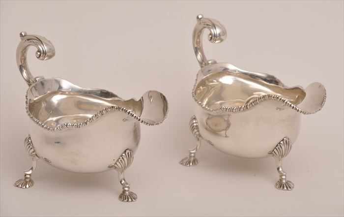 Appraisal: PAIR OF GEORGE III-STYLE SILVER SAUCE BOATS Asprey's London each