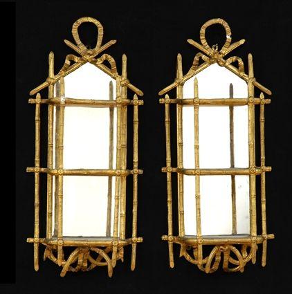 Appraisal: PAIR OF VICTORIAN GILT HANGING SHELVES Each incorporating three mirror-backed