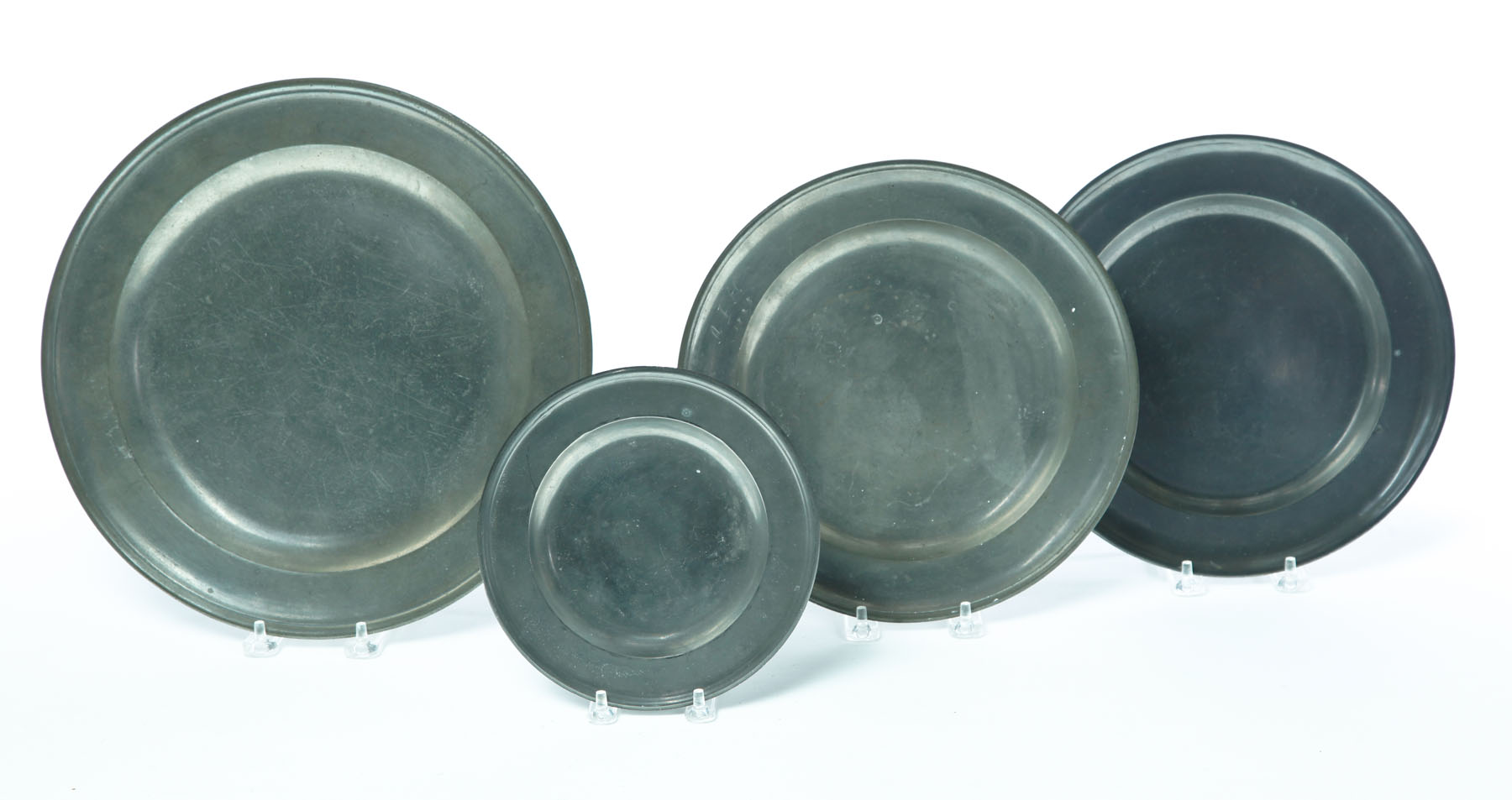 Appraisal: FOUR PEWTER PLATES European th century All have full or