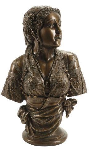 Appraisal: Patinated bronze bust of a woman on integral socle approx