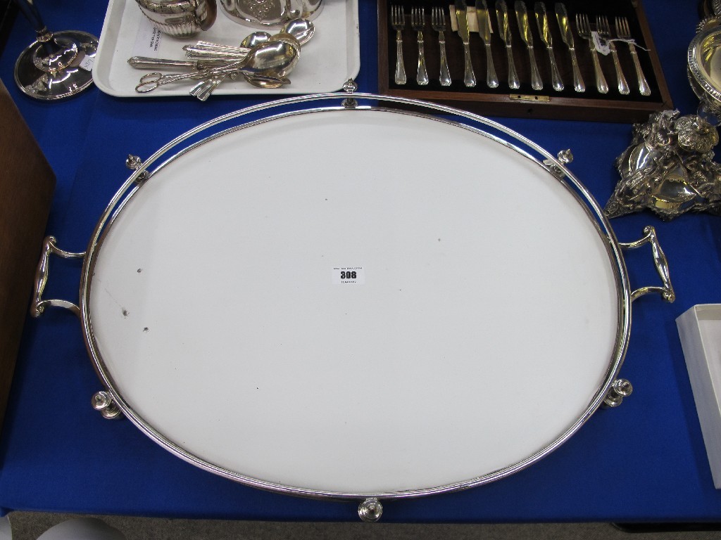 Appraisal: A silver plated double handled serving tray