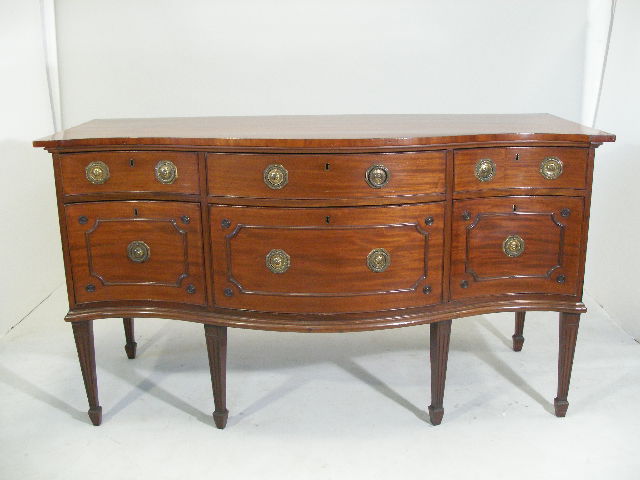 Appraisal: Georgian Hepplewhite Sideboard th c serpentine front mahogany and mahogany