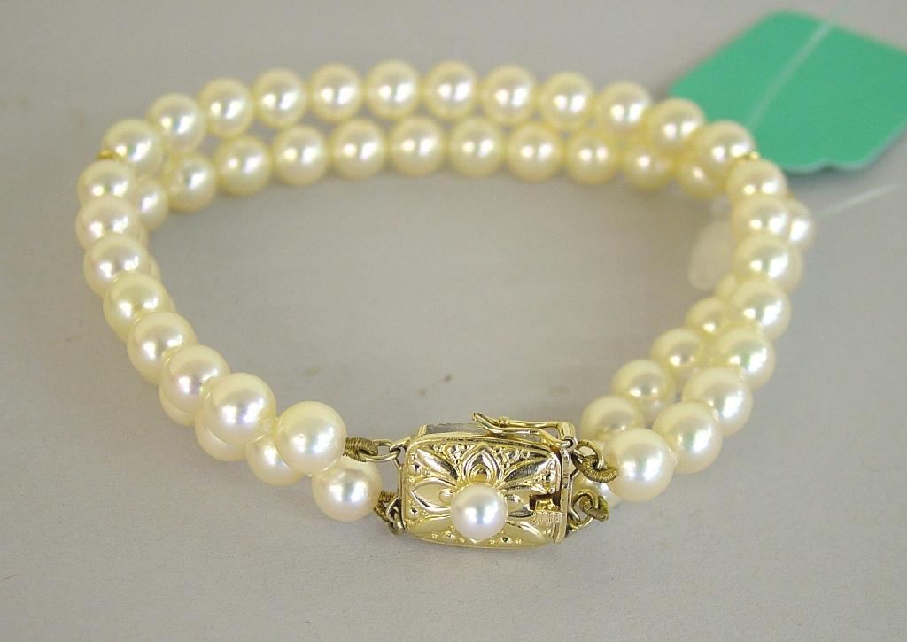 Appraisal: Double row cultured pearl bracelet with a clasp stamped 'M'