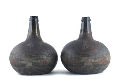 Appraisal: A large pair of Dutch olive green glass bottles each