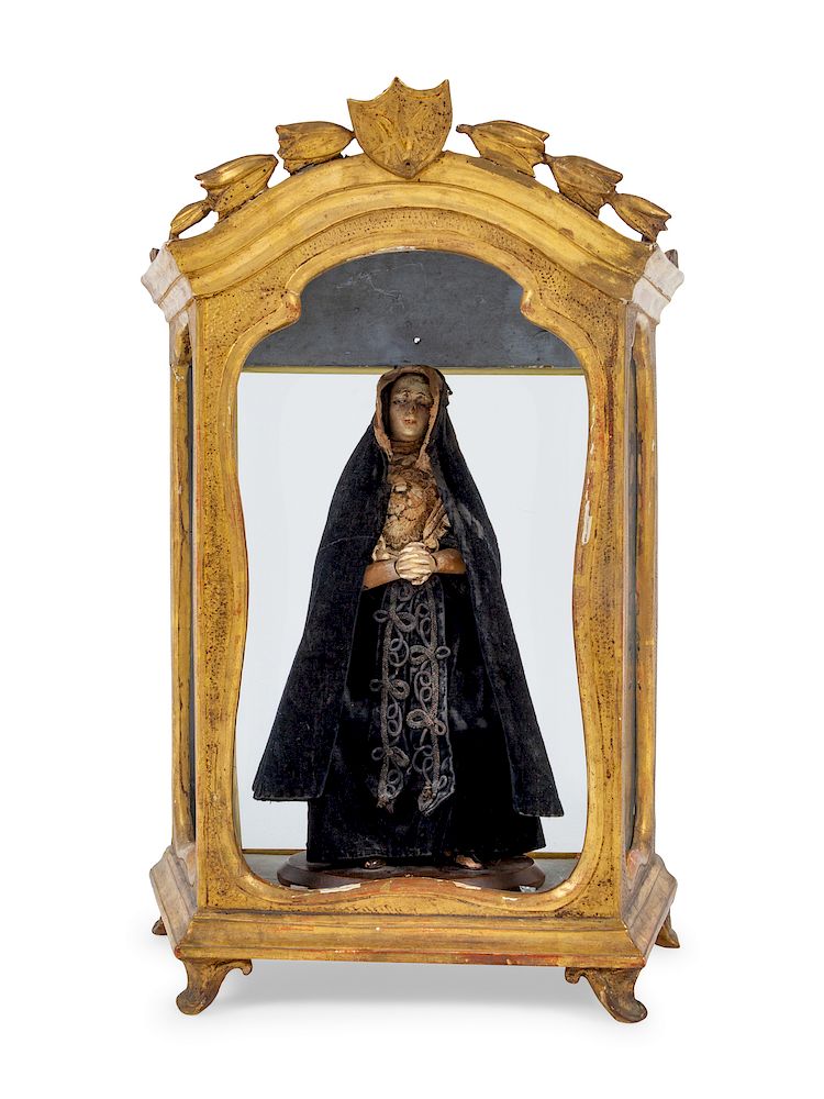 Appraisal: A Continental Giltwood Reliquary with a Painted Figure of a