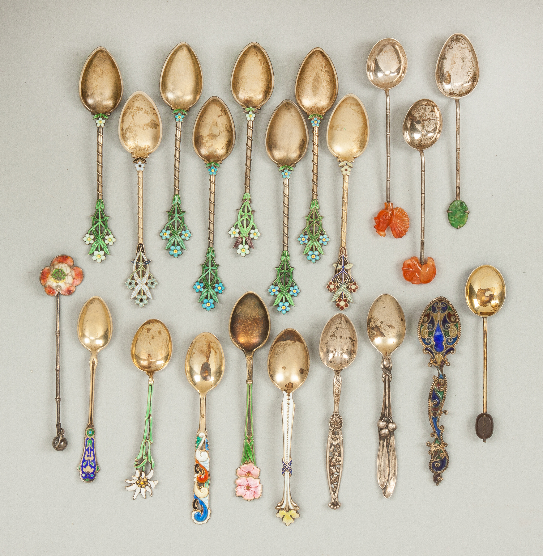 Appraisal: Various Enameled Demitasse Spoons ozt Together with silver plate demitasse