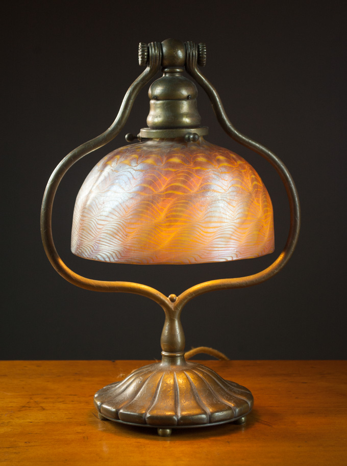 Appraisal: TIFFANY STUDIOS BRONZE DESK LAMP with bell-shaped harp H marked