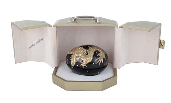 Appraisal: Theo Faberge dragon egg in case circa jet black crystal