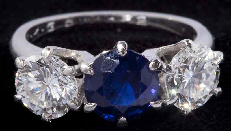 Appraisal: Platinum Diamond and Sapphire Ringcentering on one natural round sapphire