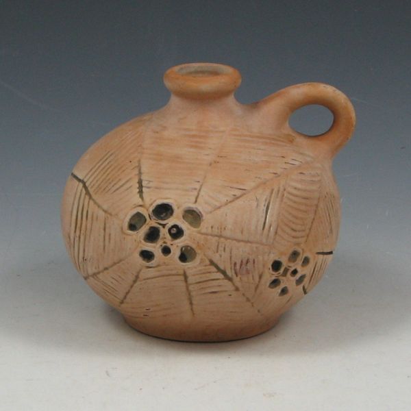 Appraisal: Weller jug with stylized spider webs The finish is a