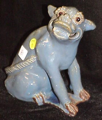 Appraisal: Chinese Shiwan porcelain figure of seated mythical animal th C