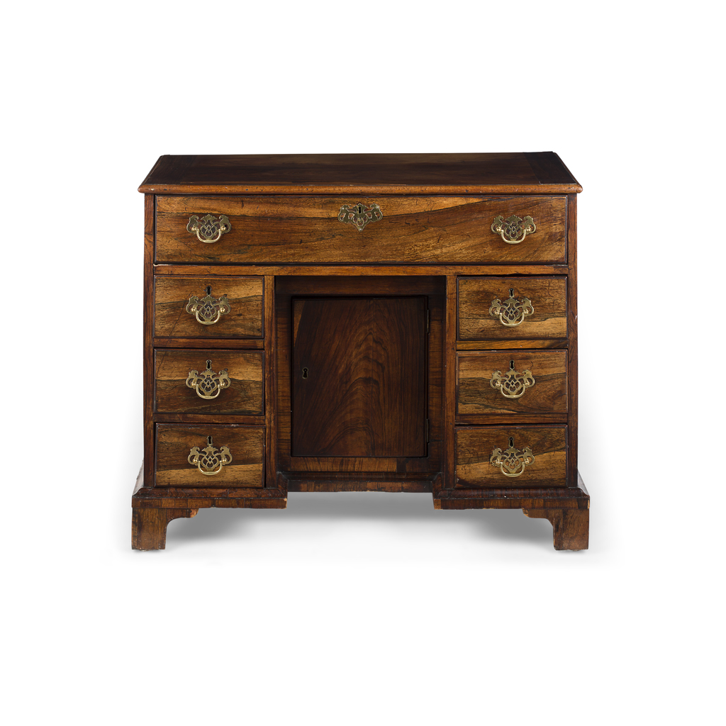 Appraisal: GEORGE III ROSEWOOD KNEEHOLE DESK TH CENTURY the rectangular top