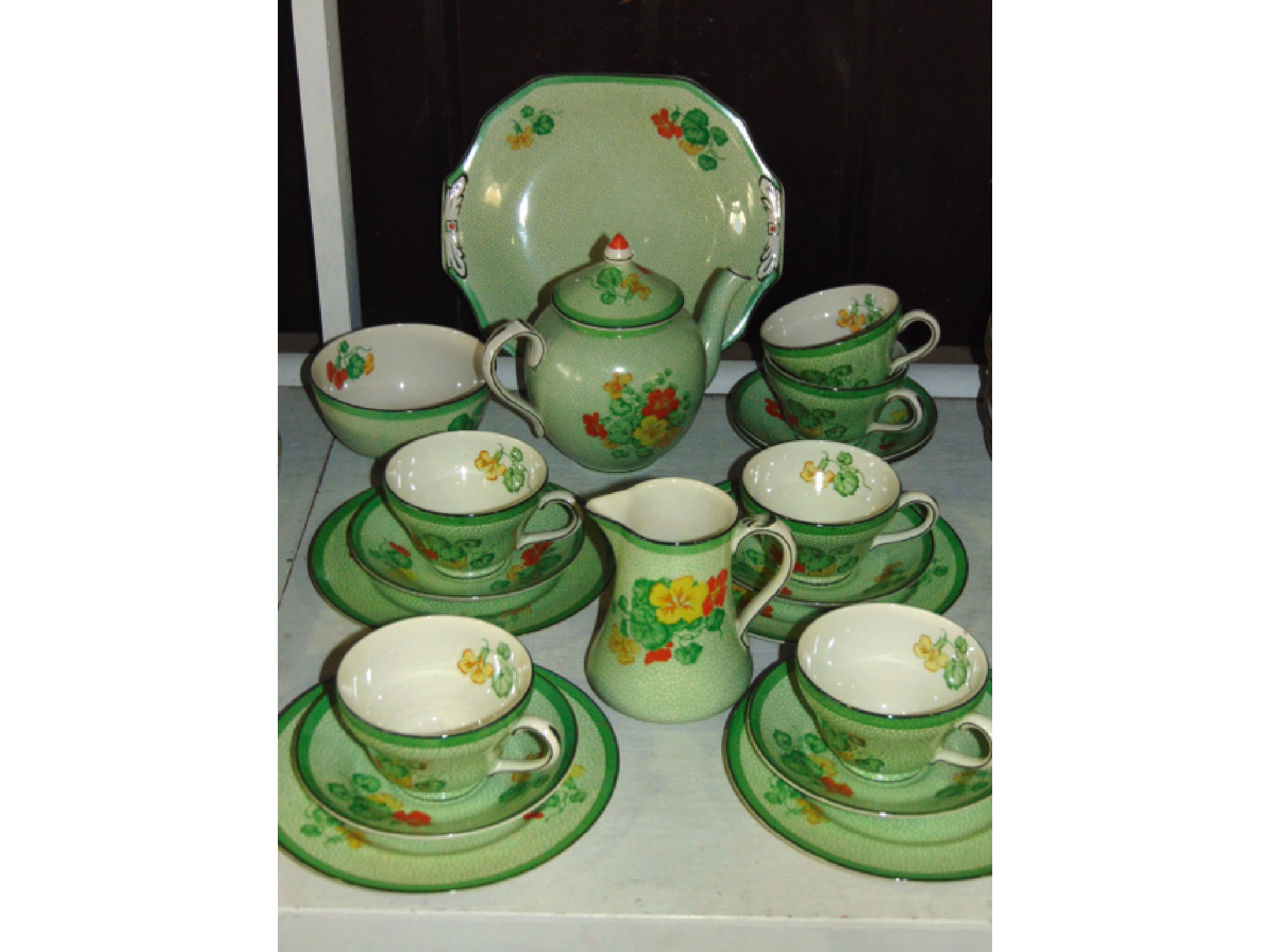 Appraisal: A collection of Booths Art Deco tea wares with printed