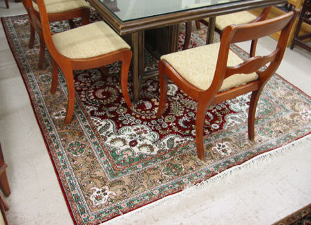 Appraisal: HAND KNOTTED ORIENTAL CARPET Sino-Persian faux silk floral and central