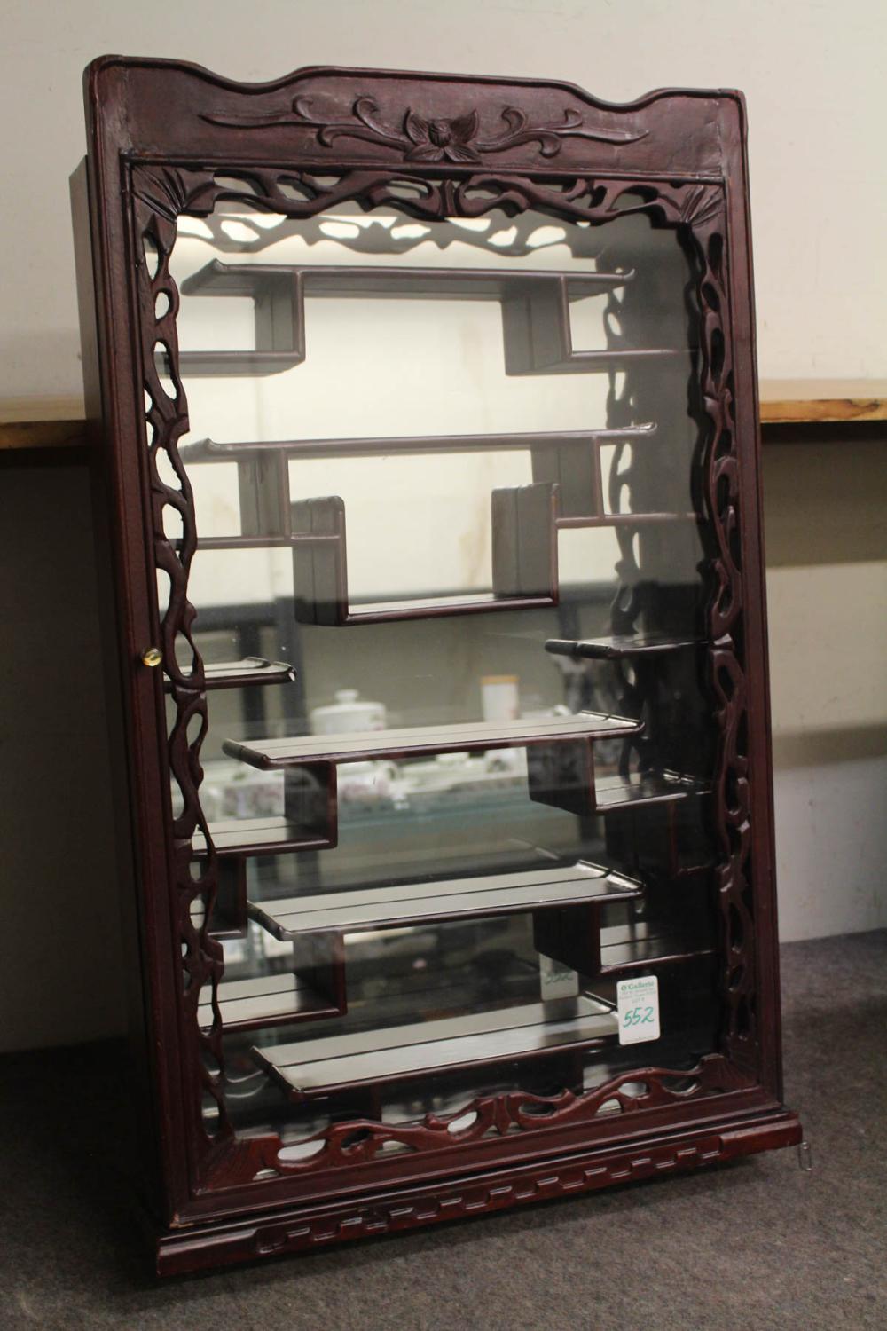 Appraisal: CHINESE WALL-MOUNT COLLECTOR CABINET having levels of shallow display shelves