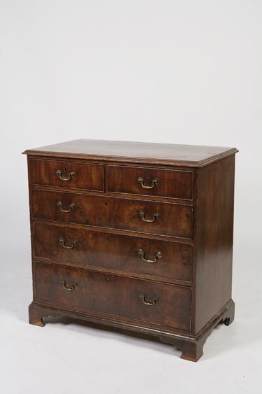 Appraisal: A GEORGE III MAHOGANY CHEST OF DRAWERS the rectangular top