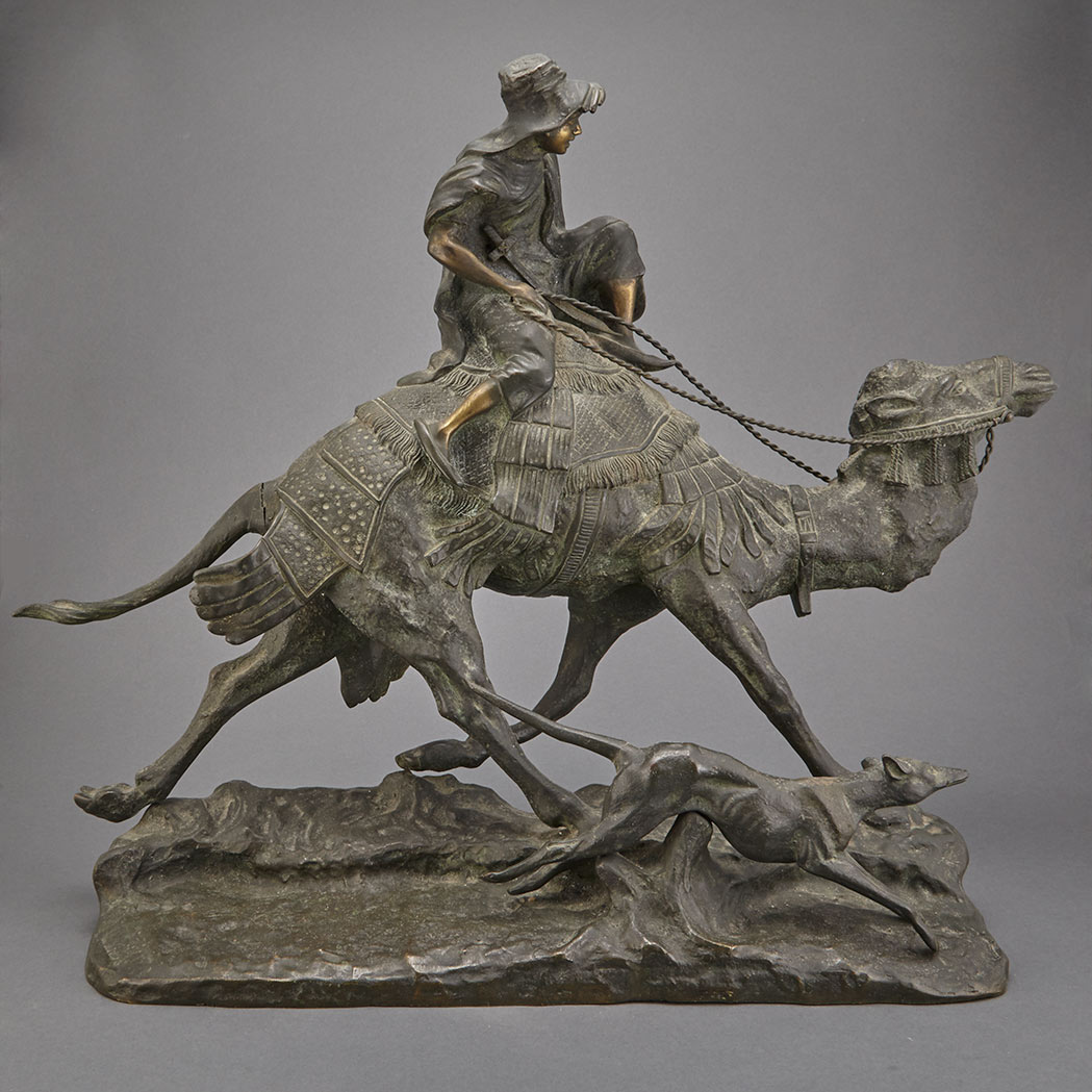 Appraisal: Unsigned Bronze Group of a Huntsman Riding a Camel Late