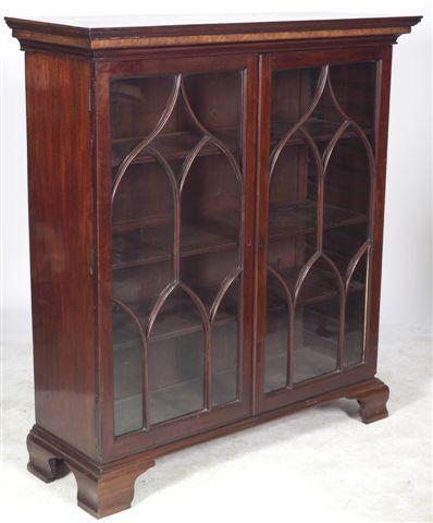 Appraisal: EDWARDIAN MAHOGANY VITRINE the rectangular moulded top above a pair