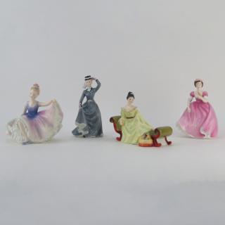 Appraisal: Group Of Four Porcelain Figurines Group Of Four Porcelain Figurines