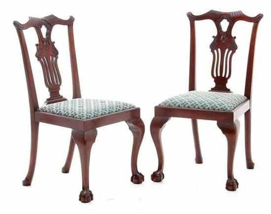 Appraisal: Pair Chippendale style carved mahogany side chairs late th century