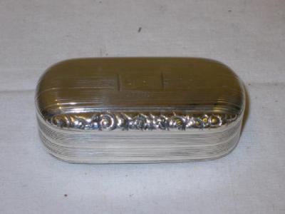 Appraisal: A GEORGE III SNUFF BOX of oval form the hinged