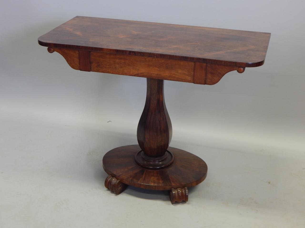 Appraisal: A thC rosewood side table on an octagonal baluster column