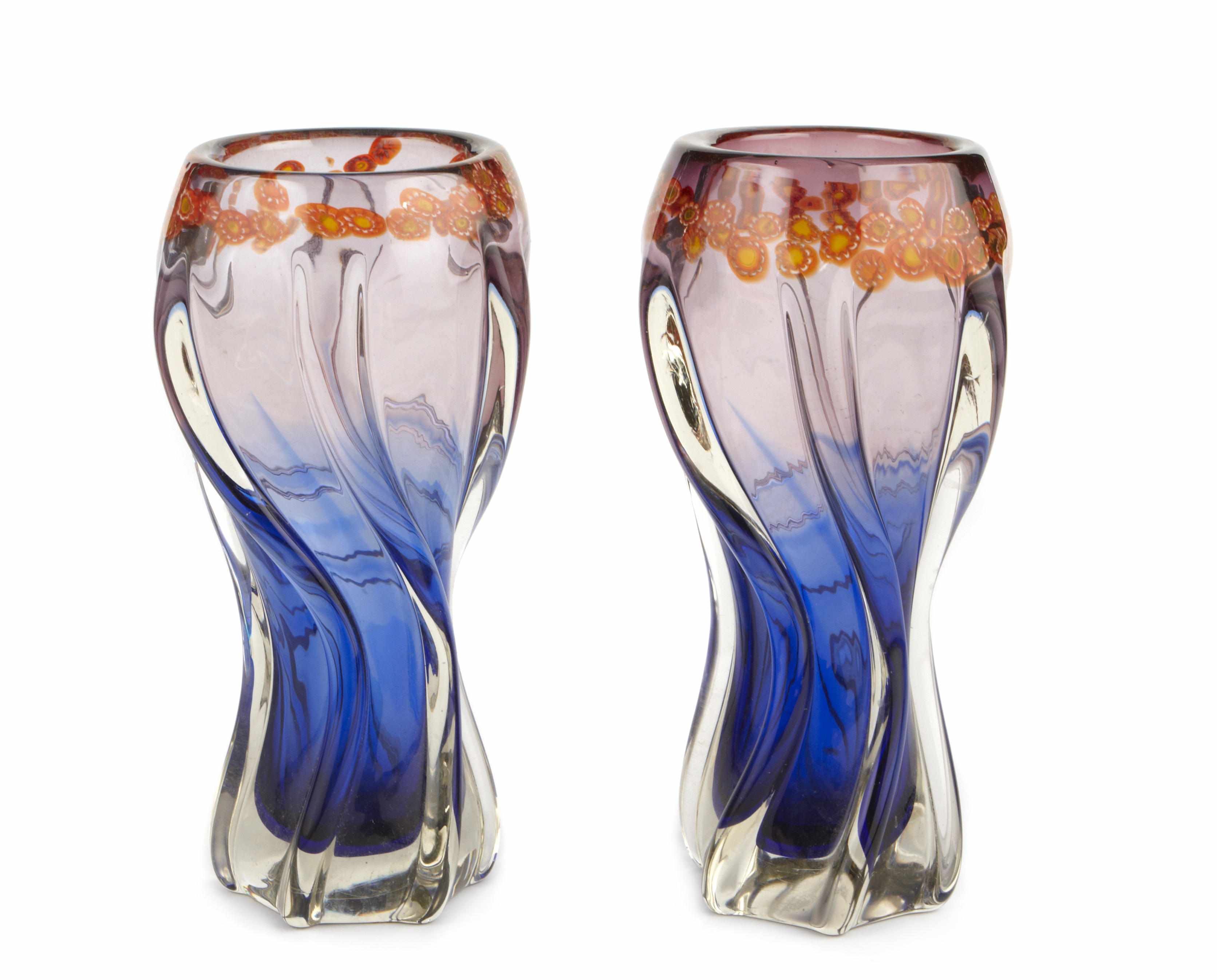 Appraisal: A pair of blue to clear glass vases with internal