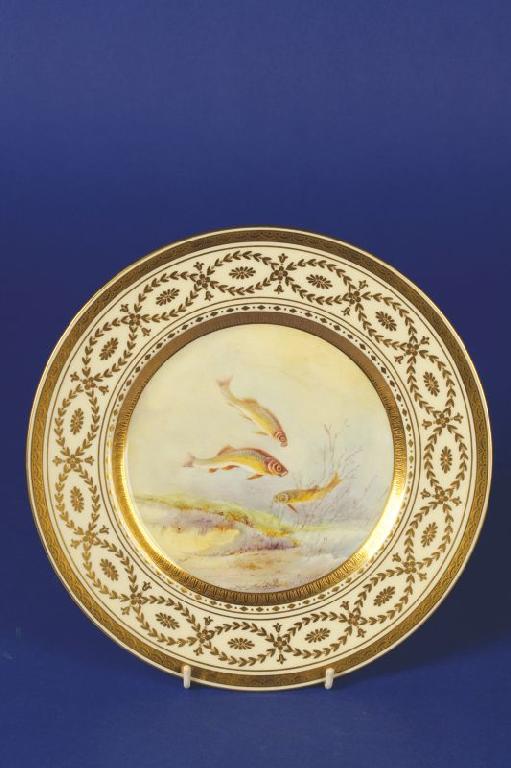 Appraisal: A MINTON PISCATORIAL DESSERT PLATE the central circular panel painted