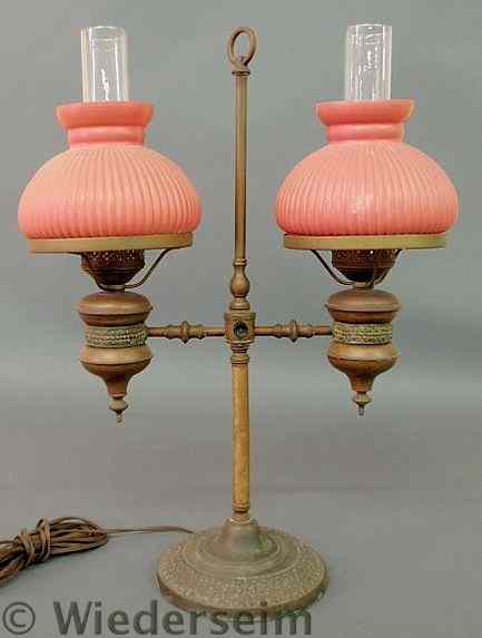 Appraisal: Brass and metal double arm student lamp with light red