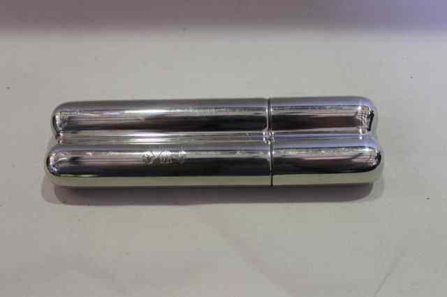 Appraisal: A SILVER PLATED TWO DIVISIONAL CIGAR CASE of plain form