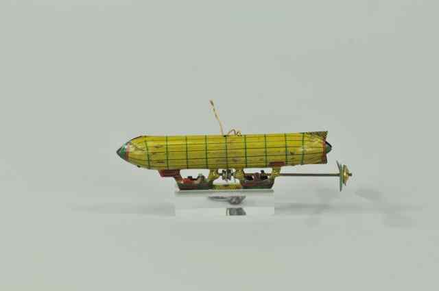 Appraisal: BLIMP PENNY TOY Germany lithographed tin when blimp is suspended