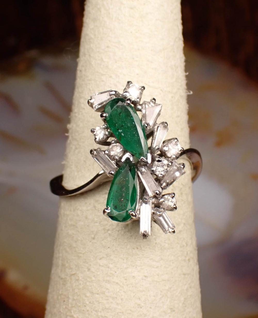 Appraisal: EMERALD DIAMOND AND EIGHTEEN KARAT GOLD RING The white gold