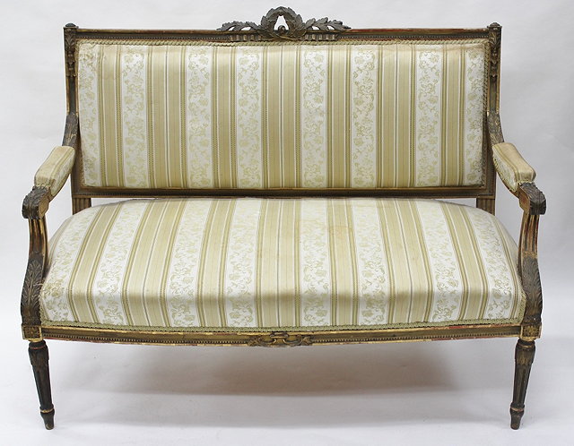 Appraisal: A TH CENTURY PAINTED AND PARCEL GILT SMALL SETTEE acanthus