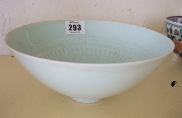 Appraisal: A qinbai bowl Song dynasty of hemispherical form carved with