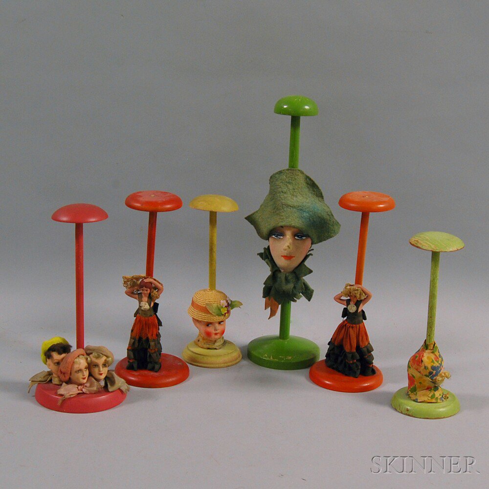 Appraisal: Six Paint-decorated Papier-mache Doll and Doll Head Hat Stands Germany