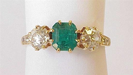 Appraisal: JEWELRY Lady's K yellow gold emerald and diamond ring This