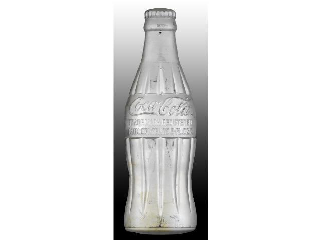 Appraisal: Coca-Cola Heavily Embossed Silver Bottle Sign Description s Die-cut General