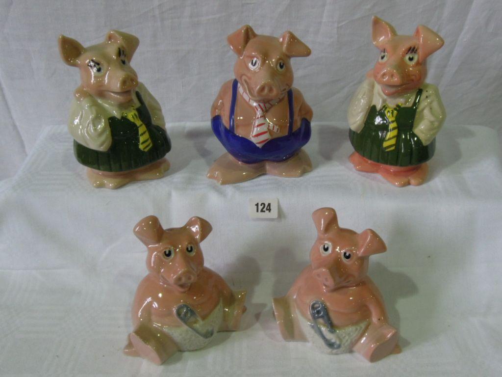 Appraisal: A collection of five Nat West pigs by Wade England