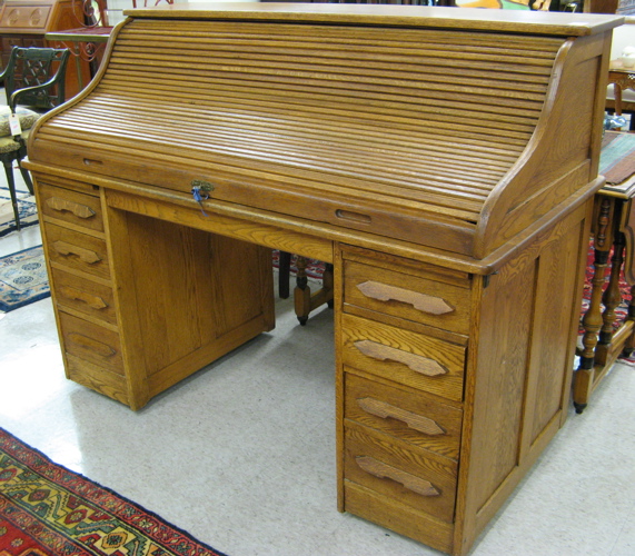 Appraisal: AN OAK ROLL-TOP DESK American late th century The double