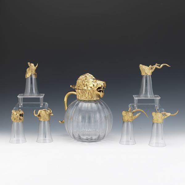 Appraisal: ZOOMORPHIC DECANTER WITH SHOT GLASSES BY VALENTI SPAIN Fluted globular