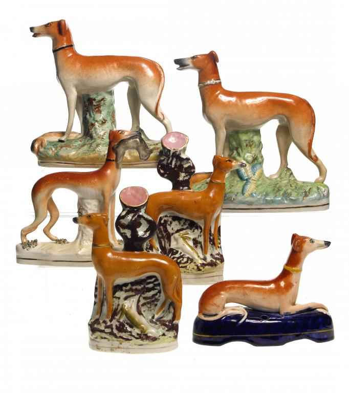 Appraisal: SIX STAFFORDSHIRE EARTHENWARE MODELS OF GREYHOUNDS including a pair of